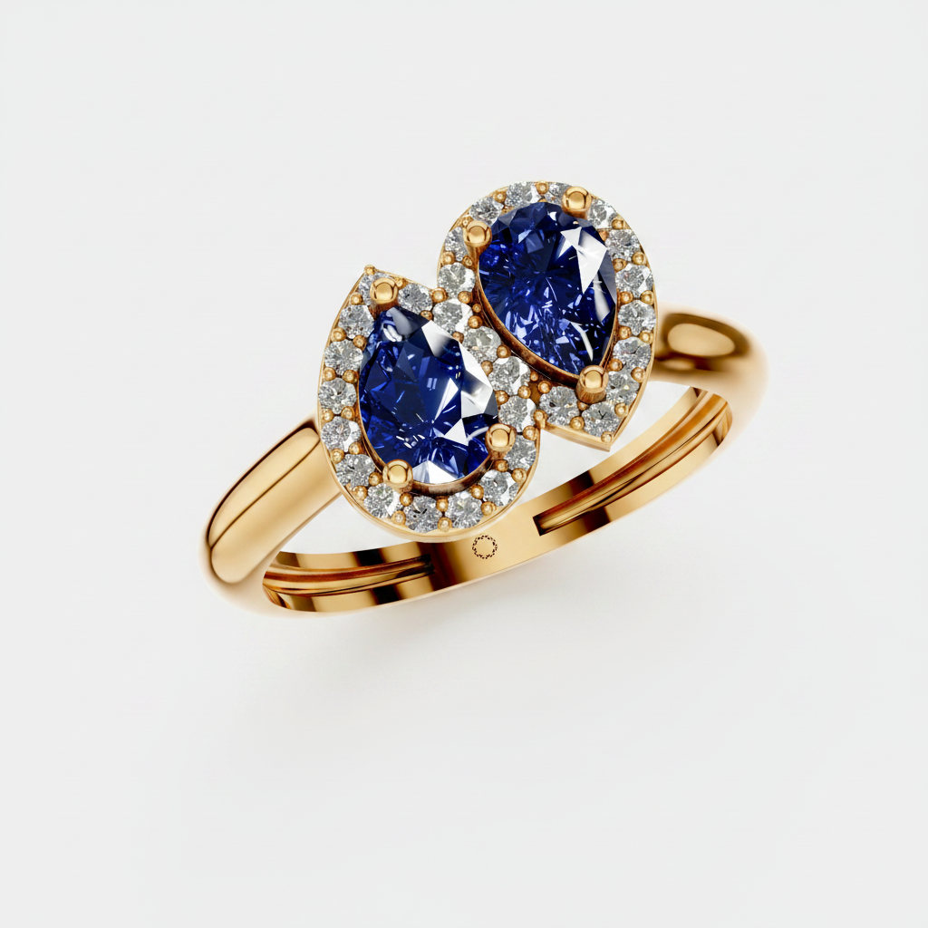 Blue pear-shaped sapphire gemstone toi et moi ring with lab-grown diamonds.
